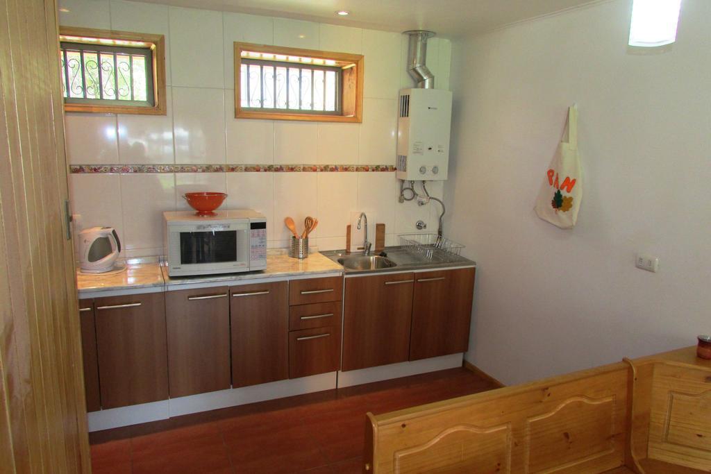 Cabanas Ancestros Coyhaique Quarto foto