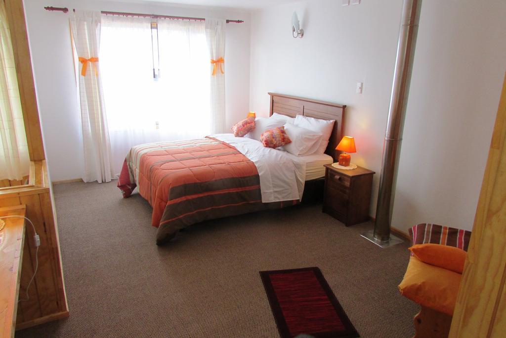 Cabanas Ancestros Coyhaique Quarto foto